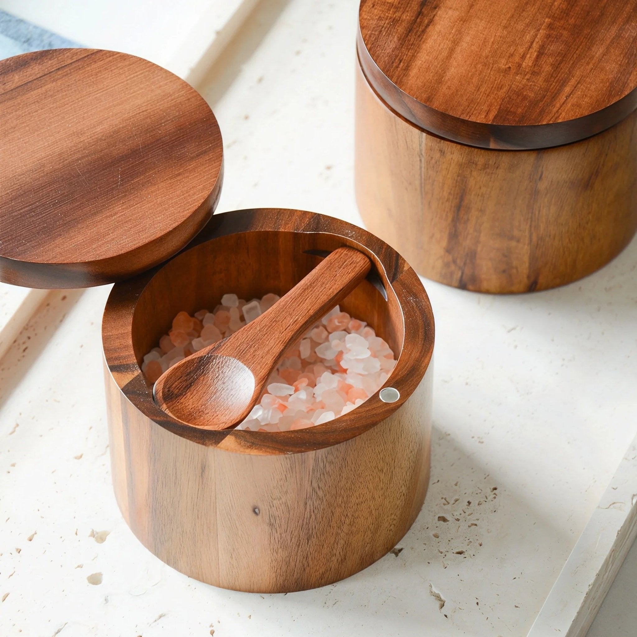 Oakory acacia wood salt cellar styled on kitchen counter with Himalayan pink salt