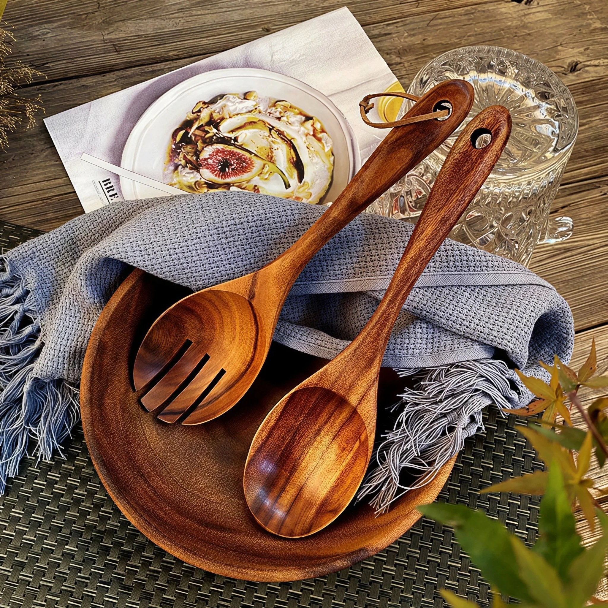 Oakory elegant acacia wooden salad utensils styled on a rustic outdoor table setting