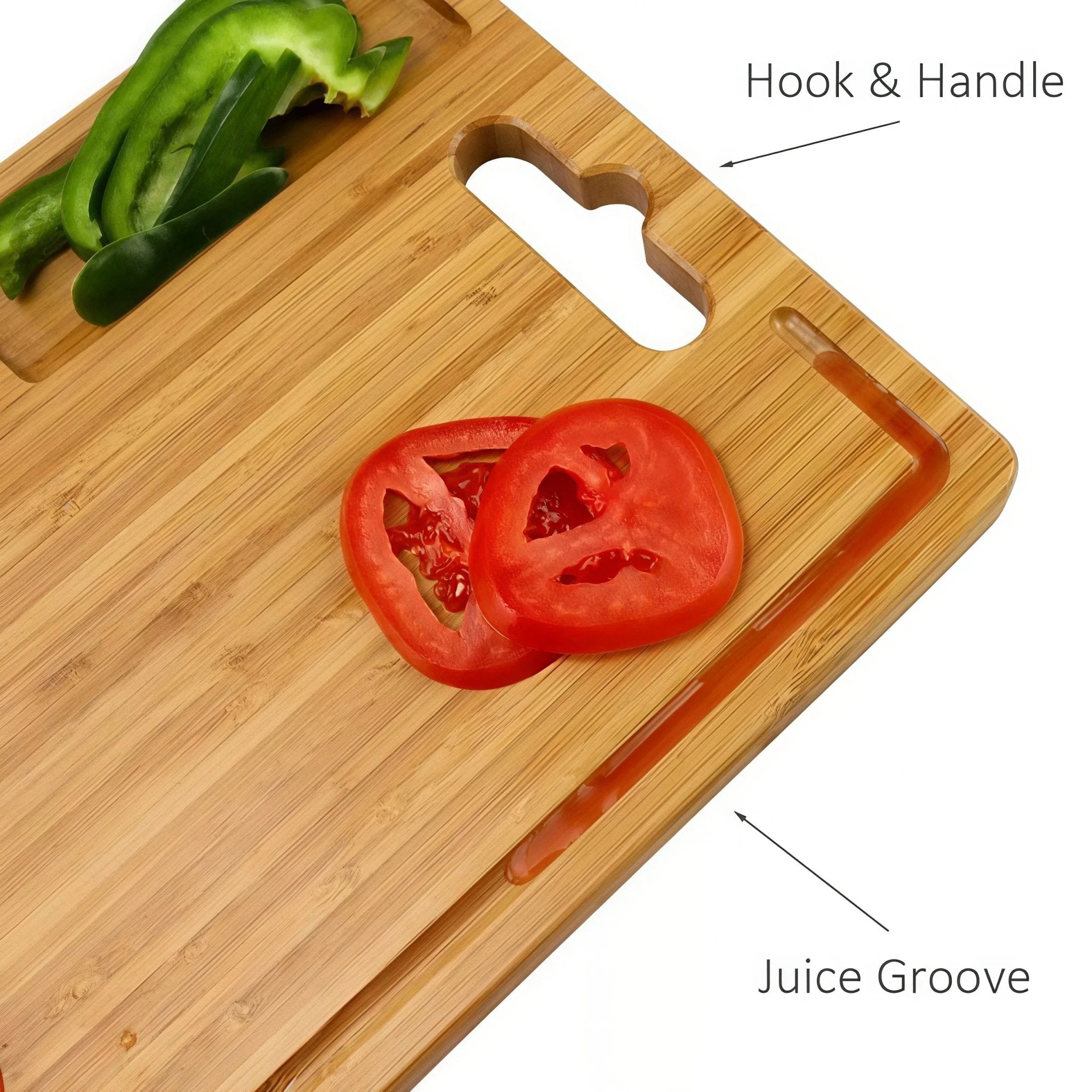 Close-up of Oakory bamboo cutting board juice groove catching tomato juice