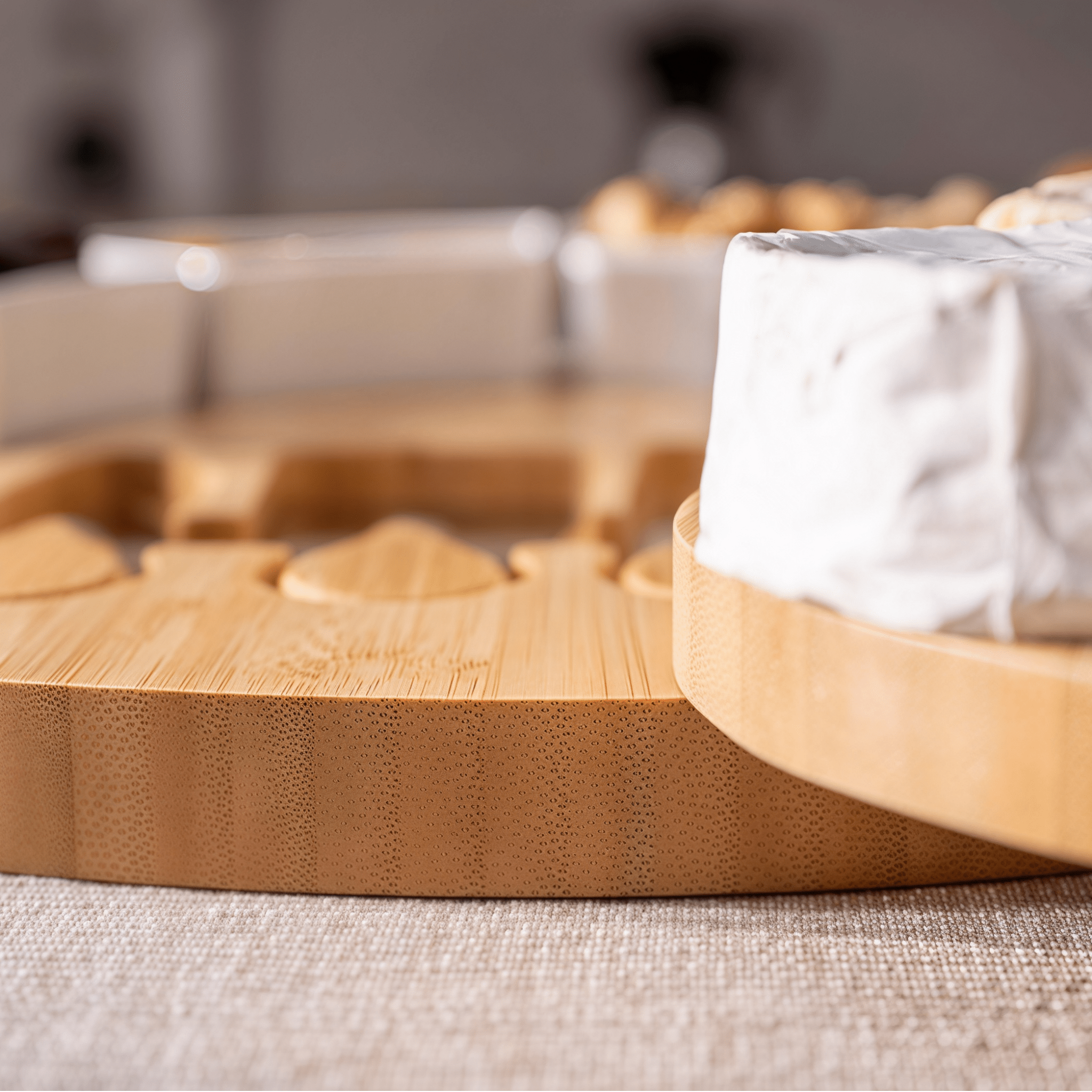 Close-up of Oakory solid acacia wood cheese board showing smooth natural grain