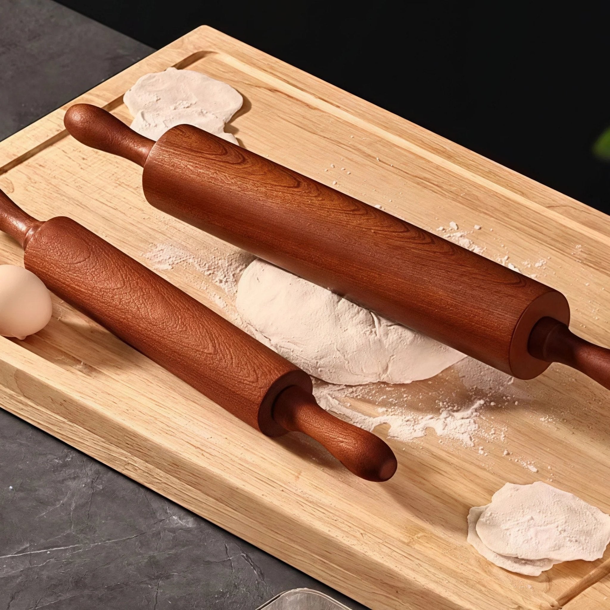 Oakory ebony wood rolling pins styled with dough and egg for home baking