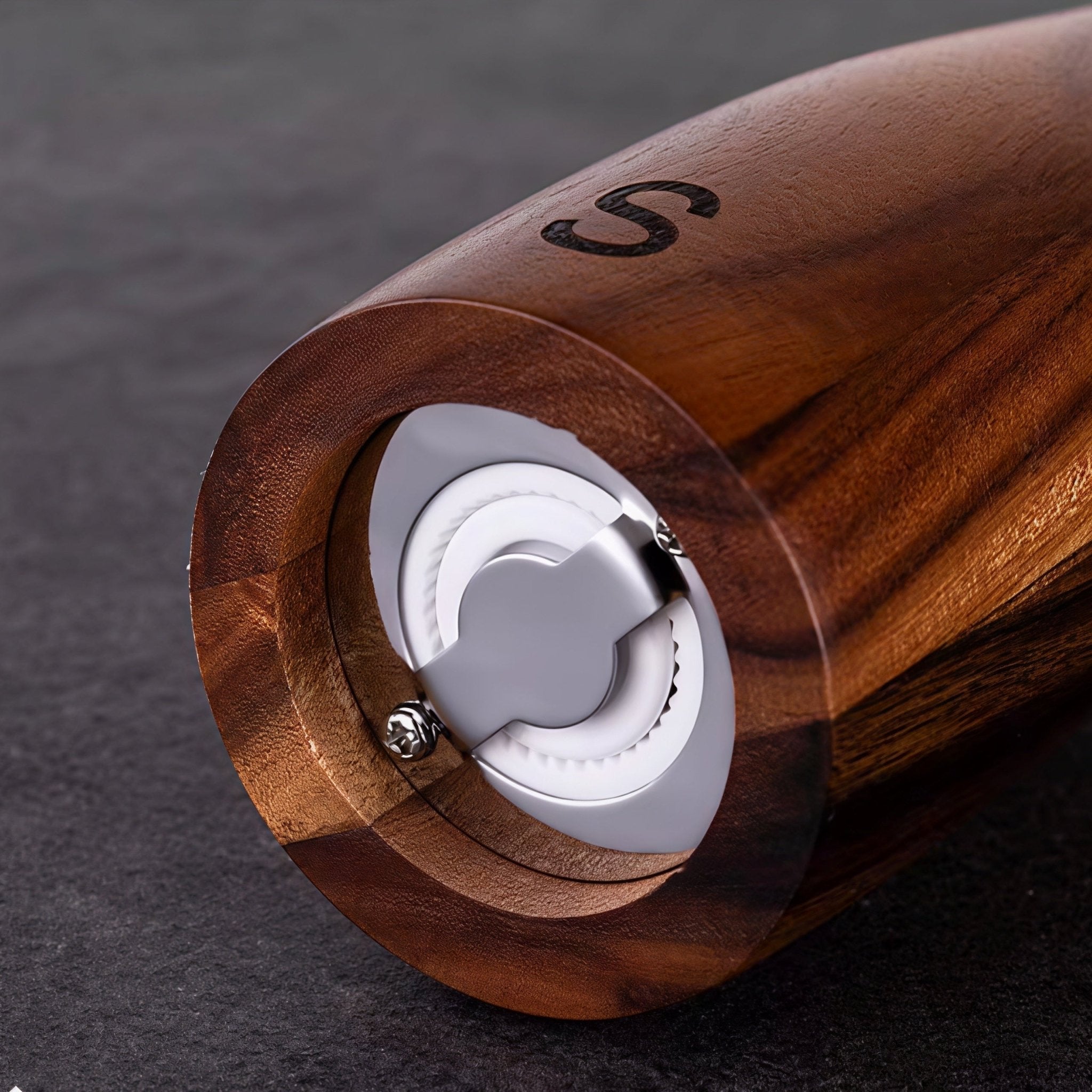 Close-up of Oakory acacia wood salt grinder ceramic grinding core for adjustable coarseness
